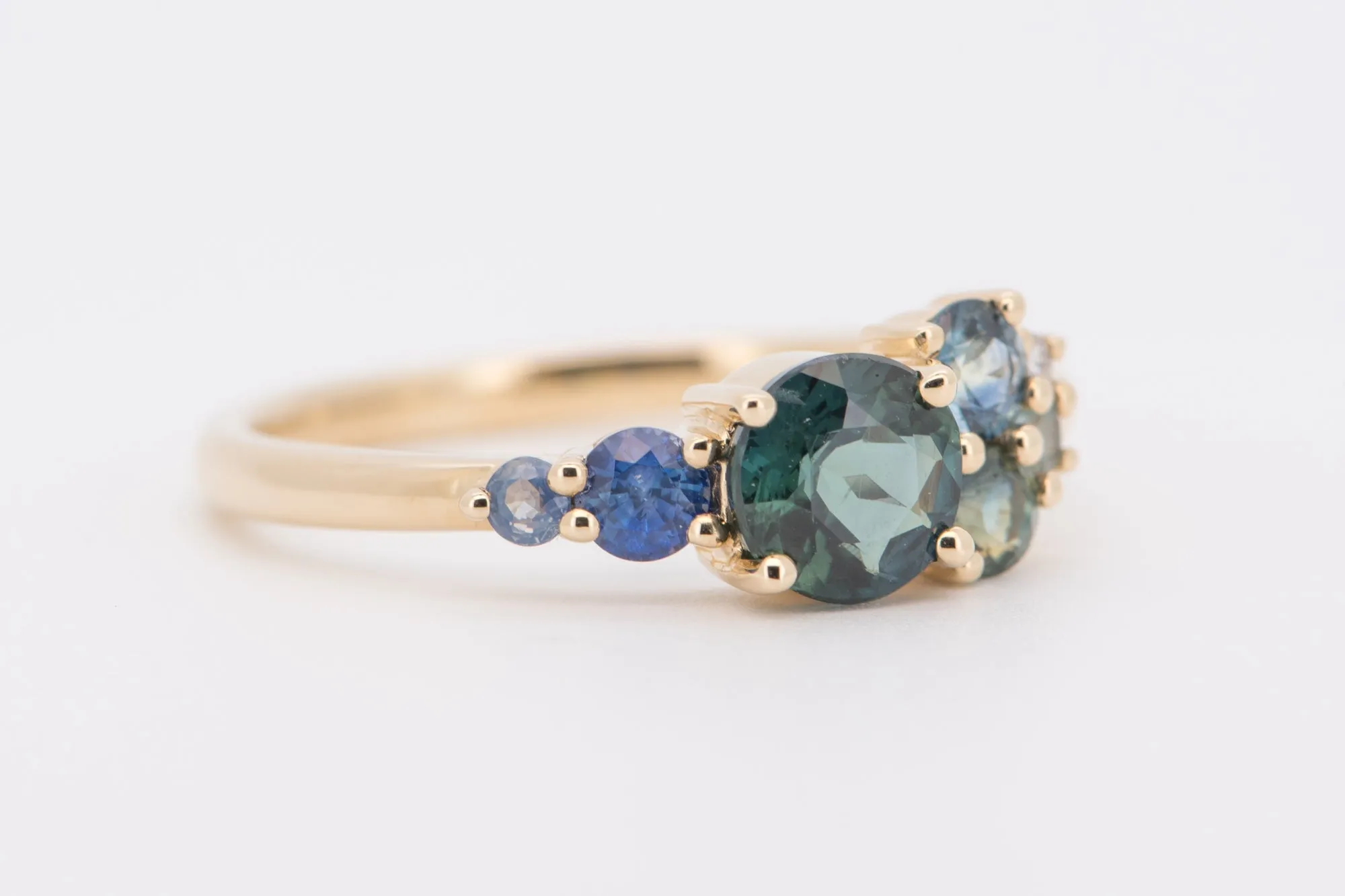 Mermaid Sapphire Cluster Ring in 14K Gold with Nigerian Montana Stones